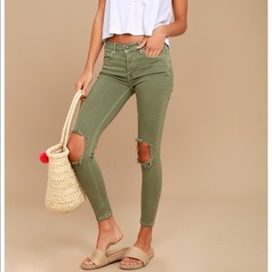 Army green FREE PEOPLE distressed skinny jeans